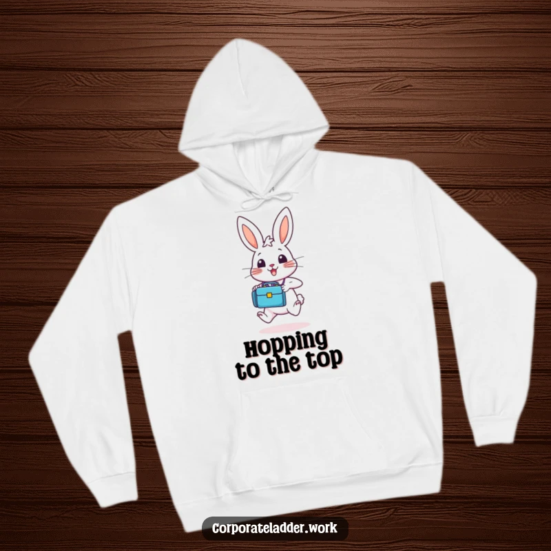 Funny bunny with a tiny briefcase, hopping with enthusiasm upwards, depicted on a comfy hoodie for a humorous, motivational vibe.